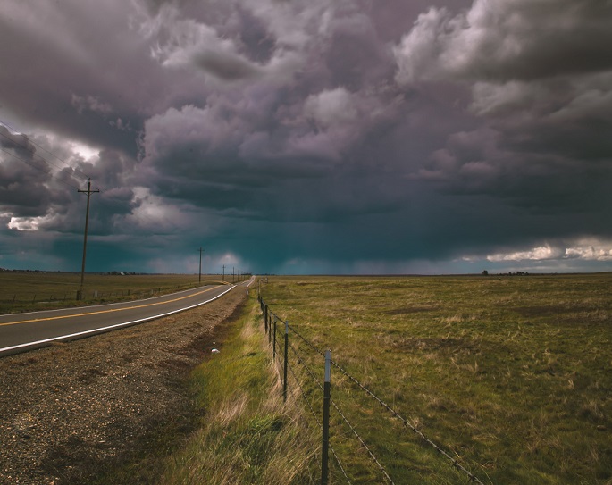 picture of road and sky in central valley