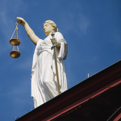 statue holding scales of justice
